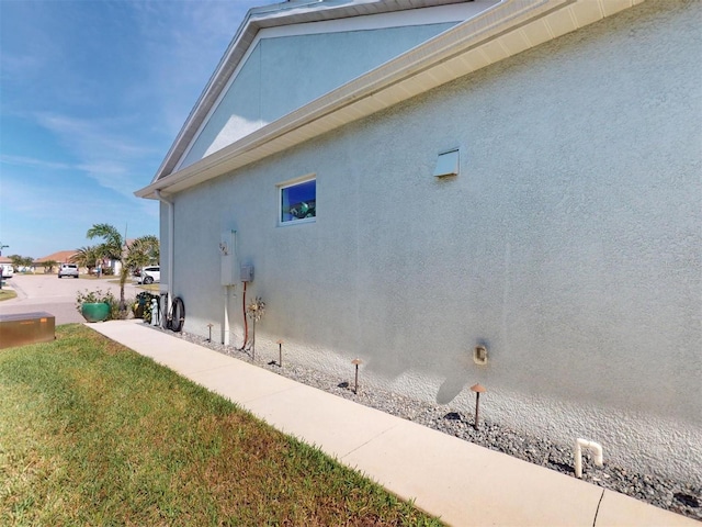 24313 Westgate Blvd, Punta Gorda, FL 33980 - view of side of property with stucco siding