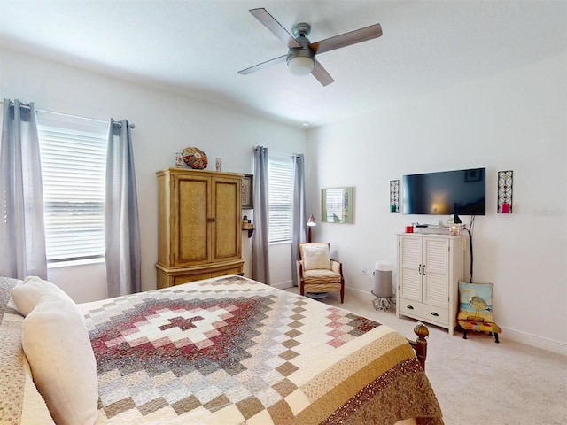 24313 Westgate Blvd, Punta Gorda, FL 33980 - bedroom with carpet, a ceiling fan, and baseboards