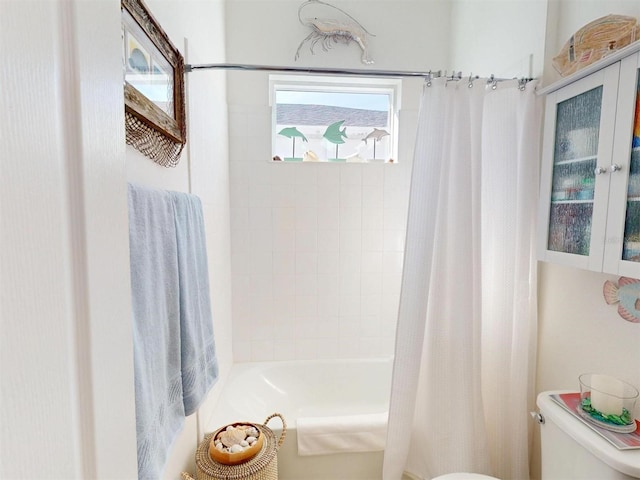 24313 Westgate Blvd, Punta Gorda, FL 33980 - bathroom featuring toilet and shower / bathtub combination with curtain