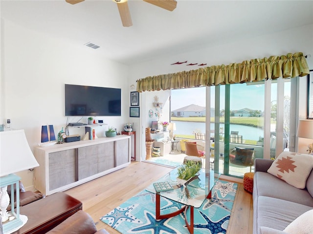 24313 Westgate Blvd, Punta Gorda, FL 33980 - living area with wood finished floors and a ceiling fan