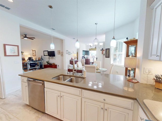 24313 Westgate Blvd, Punta Gorda, FL 33980 - kitchen featuring dishwasher, a chandelier, pendant lighting, ceiling fan, and open floor plan