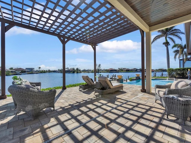 view of patio featuring a pergola and a water view