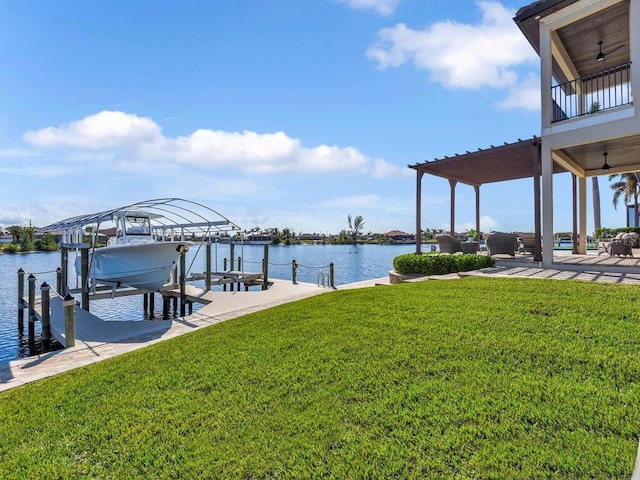 view of dock featuring a water view and a lawn