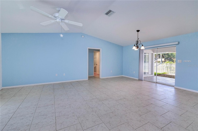 spare room with ceiling fan with notable chandelier, baseboards, visible vents, and lofted ceiling