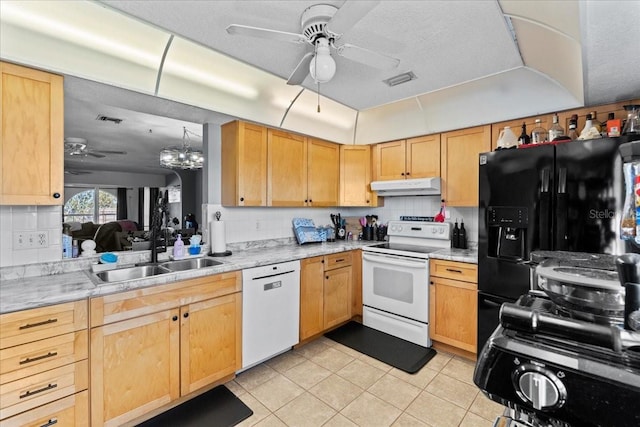 kitchen featuring light tile patterned flooring, sink, white appliances, ceiling fan with notable chandelier, and decorative backsplash