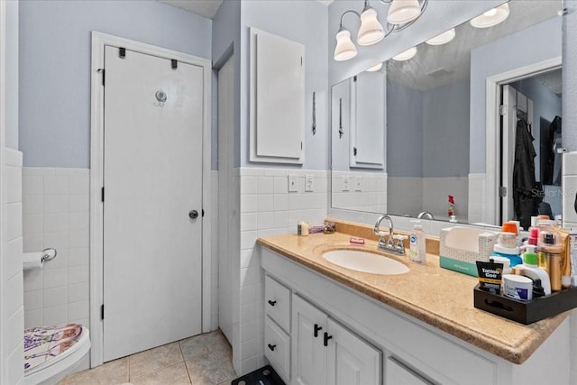 bathroom featuring vanity, tile walls, and tile patterned floors