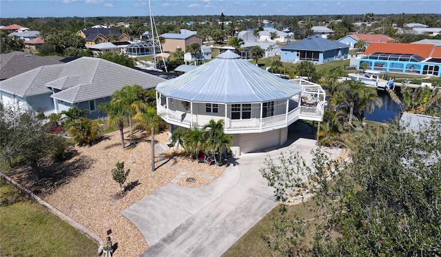 birds eye view of property with a residential view