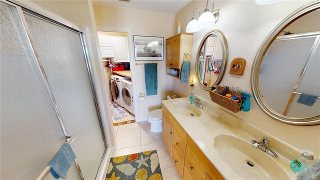 bathroom with double vanity, a stall shower, tile patterned flooring, and a sink