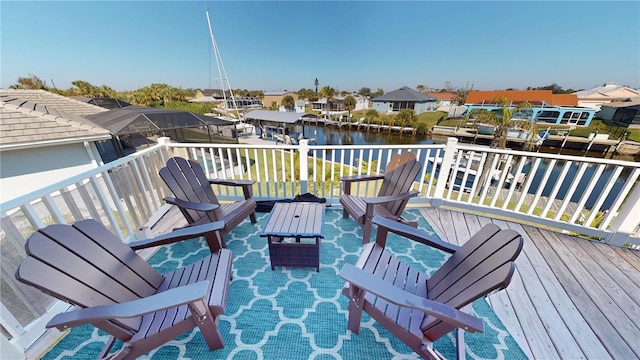 wooden deck with a water view