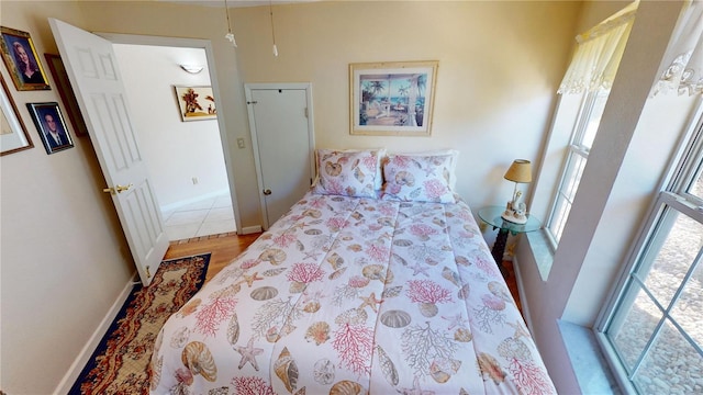 bedroom featuring baseboards