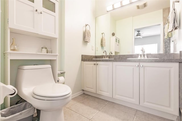 full bathroom featuring tile patterned flooring, visible vents, a sink, and toilet