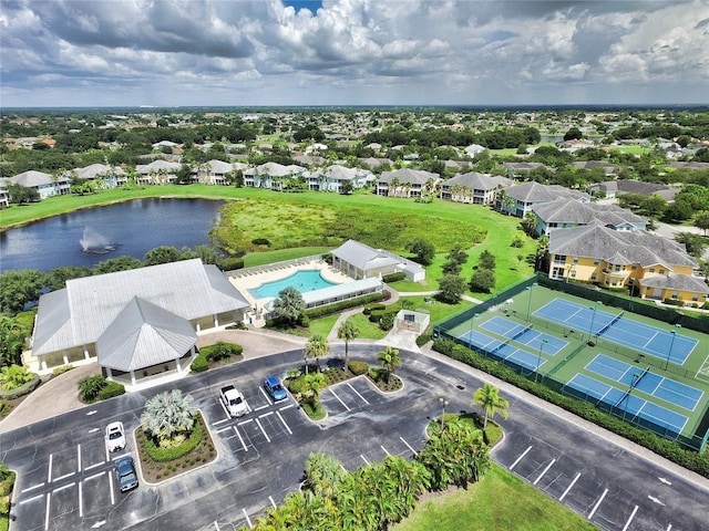 bird's eye view with a residential view and a water view