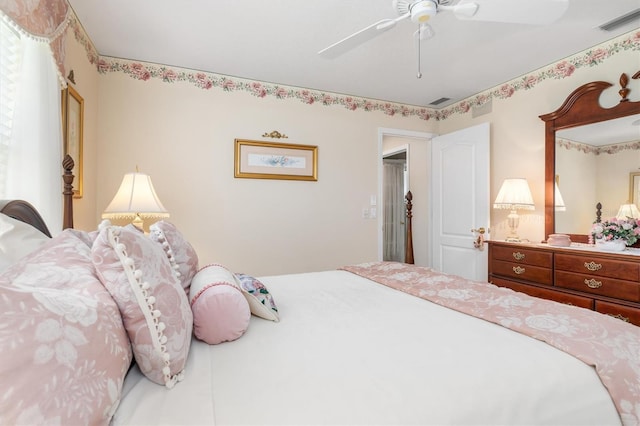 bedroom with a ceiling fan and visible vents