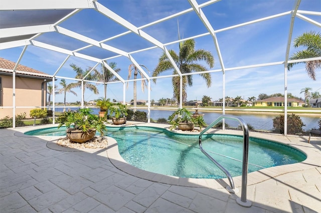 outdoor pool with a patio, a water view, and a lanai