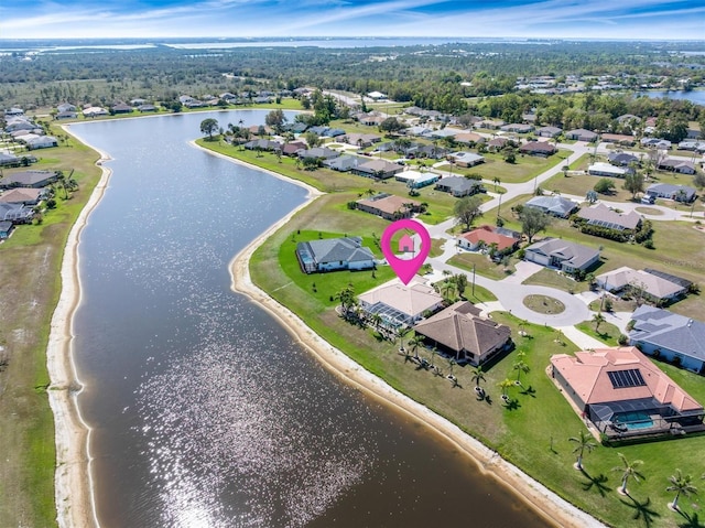 aerial view with a water view and a residential view