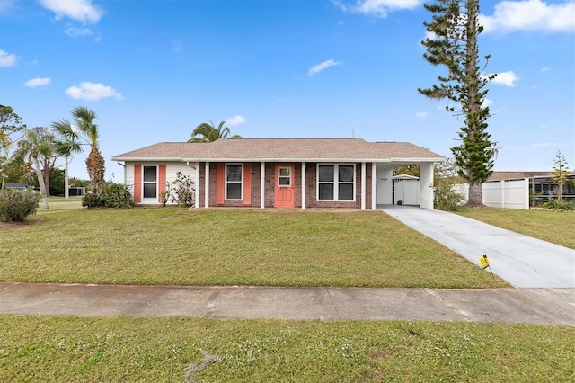 ranch-style home with a front lawn and a carport