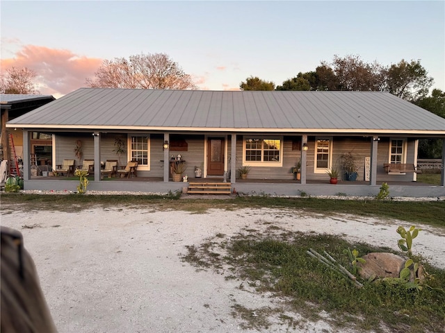 view of front of home featuring covered porch