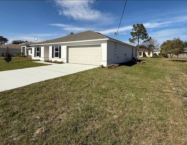 single story home with an attached garage, stucco siding, concrete driveway, and a front yard