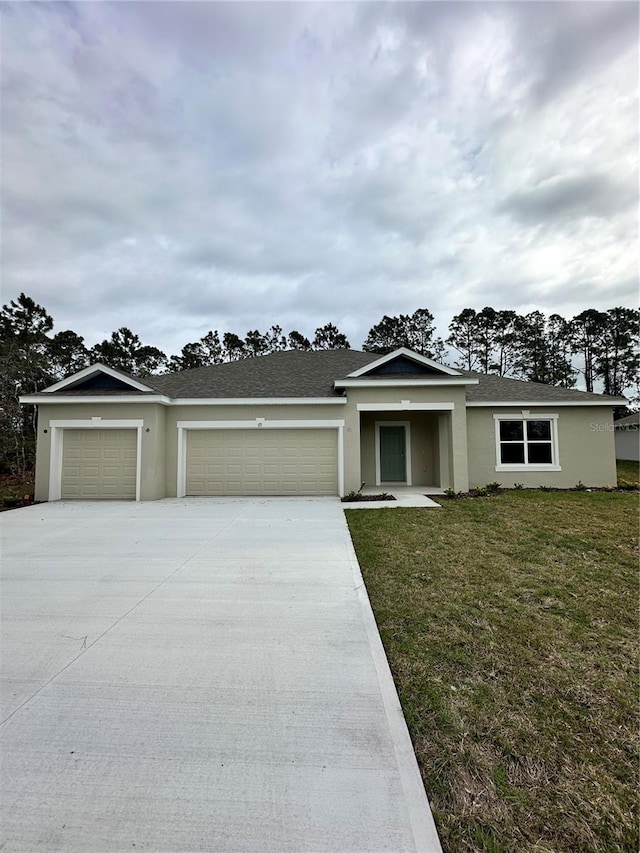 ranch-style house featuring an attached garage, a shingled roof, driveway, stucco siding, and a front lawn