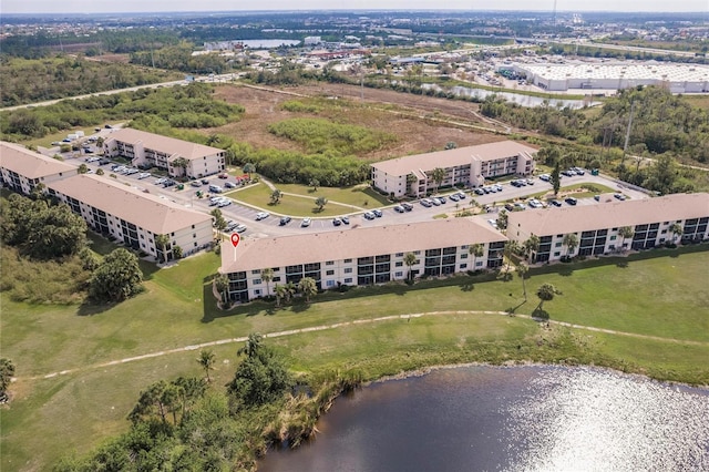 bird's eye view with a water view