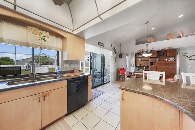 kitchen with decorative light fixtures, light tile patterned floors, light brown cabinets, a sink, and dishwasher