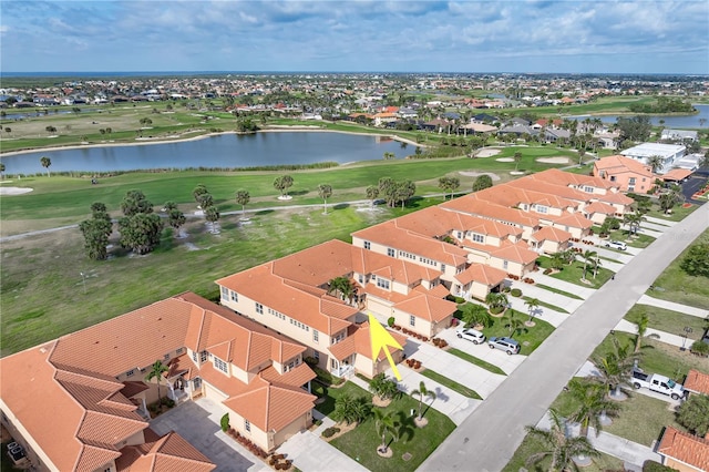 aerial view featuring a residential view and a water view