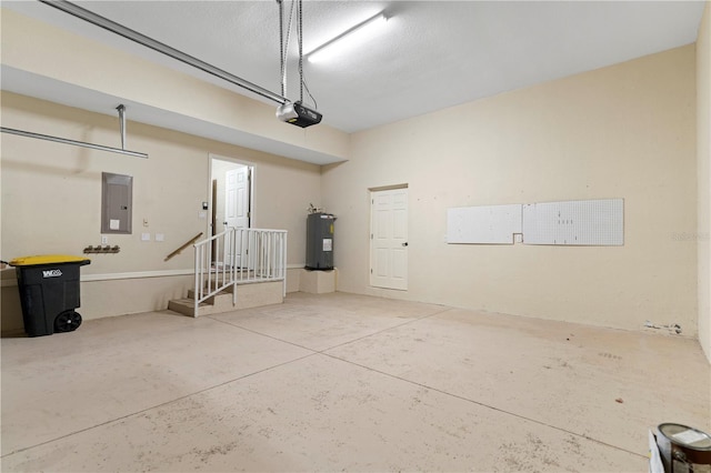 garage featuring electric panel, a garage door opener, and electric water heater