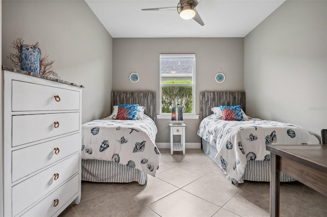 tiled bedroom with ceiling fan