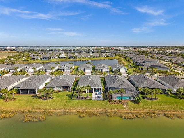 drone / aerial view with a water view