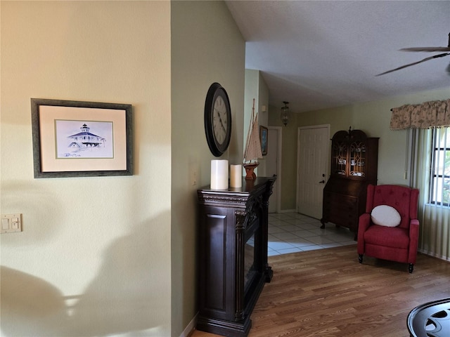 interior space featuring vaulted ceiling and wood finished floors