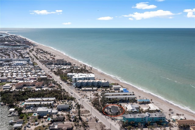 aerial view featuring a water view and a beach view