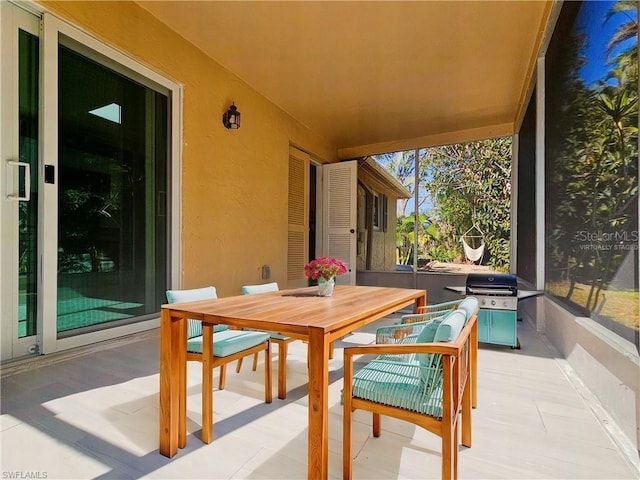 view of patio / terrace with outdoor dining area and grilling area