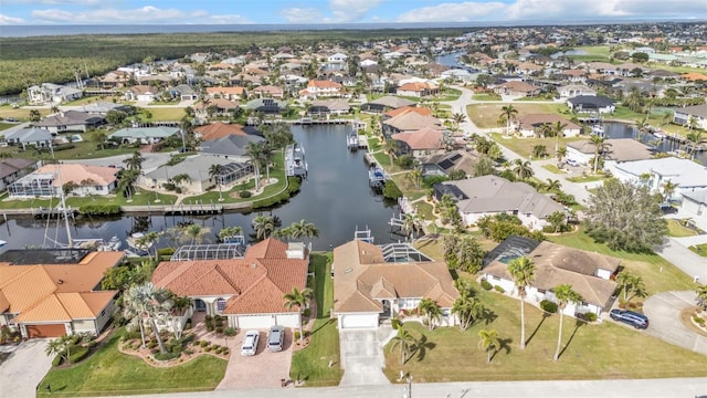 aerial view featuring a water view and a residential view