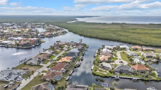 aerial view with a water view and a residential view