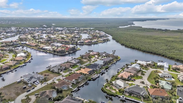 aerial view featuring a residential view and a water view