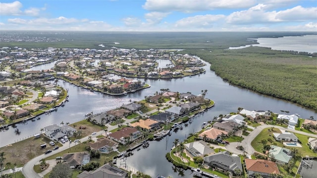 aerial view with a water view and a residential view