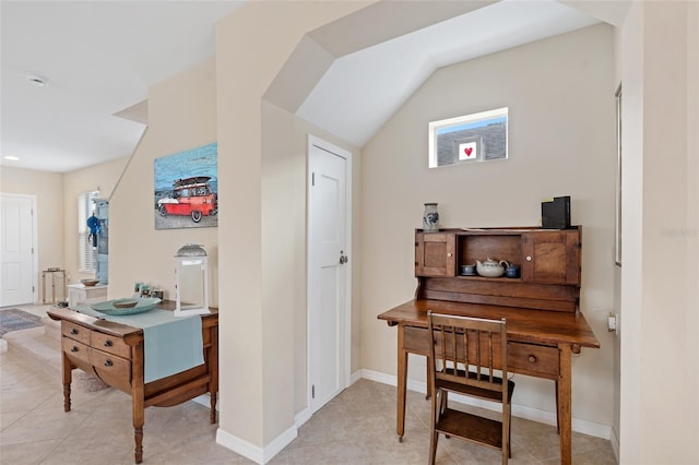 sitting room with light tile patterned flooring and baseboards