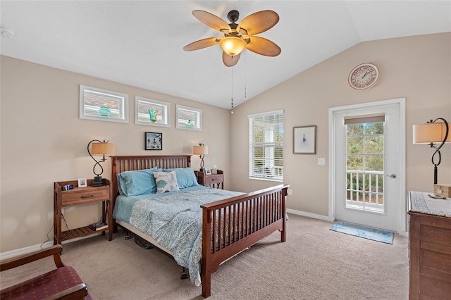 carpeted bedroom with access to exterior, multiple windows, baseboards, and vaulted ceiling