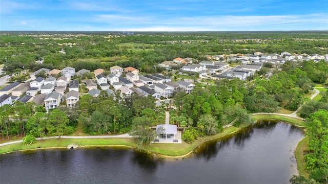 birds eye view of property featuring a water view and a residential view