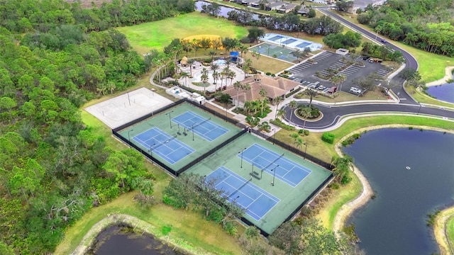 birds eye view of property featuring a water view