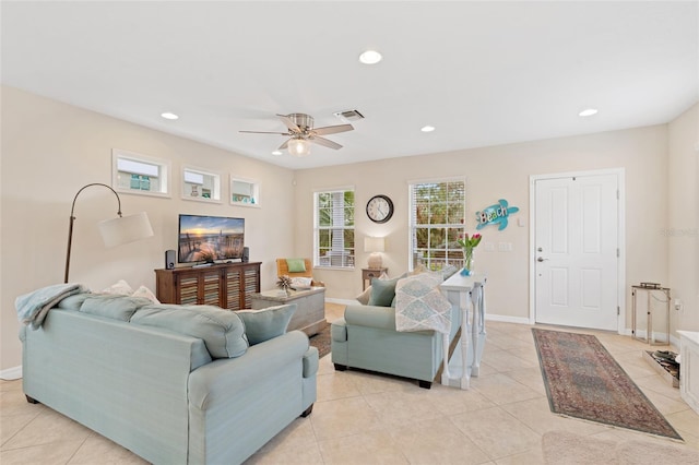 living room featuring recessed lighting, visible vents, and baseboards