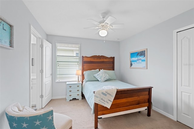 bedroom featuring ceiling fan, carpet flooring, and baseboards