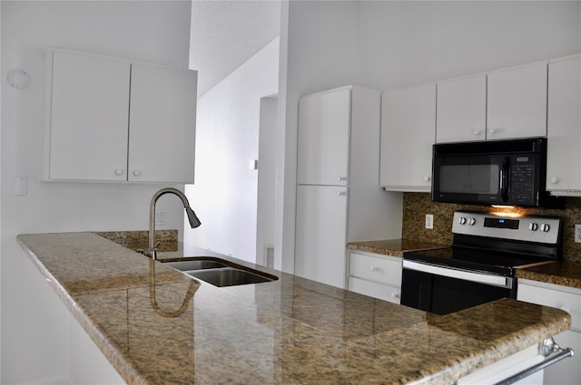 kitchen with tile counters, white cabinets, a sink, stainless steel range with electric stovetop, and black microwave