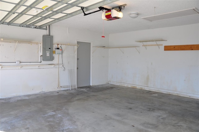 garage featuring a garage door opener and electric panel