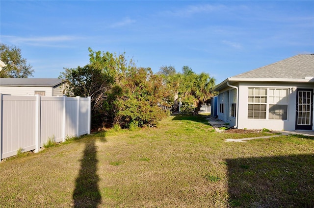 view of yard with fence