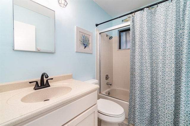 full bathroom featuring toilet, washtub / shower combination, and vanity