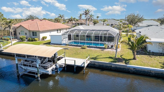 view of dock with boat lift, a water view, a lanai, and an outdoor pool