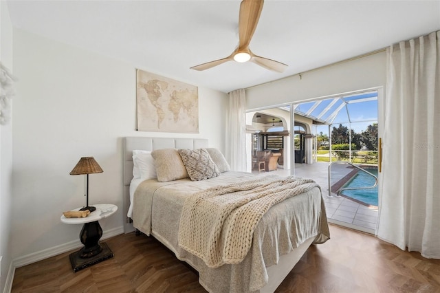 bedroom featuring ceiling fan, access to outside, a sunroom, and baseboards