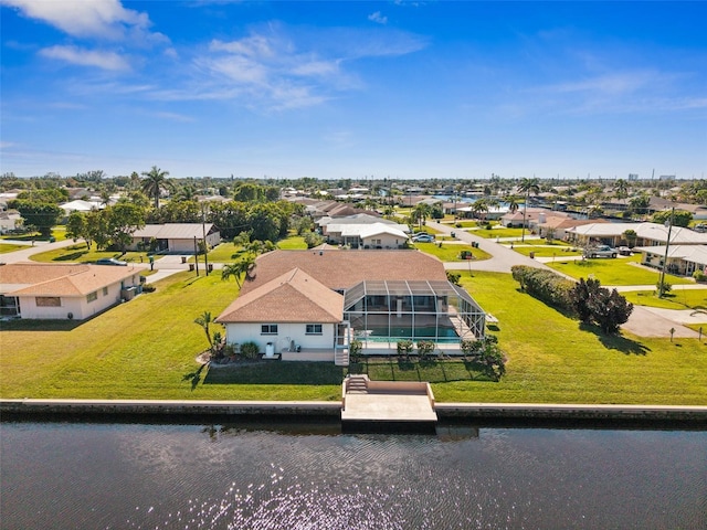 aerial view featuring a residential view and a water view