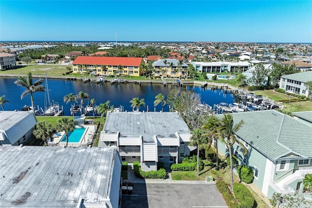 aerial view with a residential view and a water view